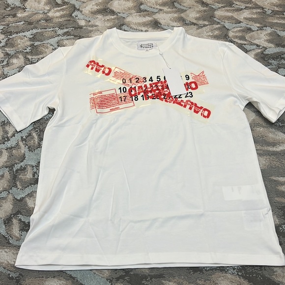 MAISON MARGIELA
LOGO-PRINTED T-SHIRT - Picture 6 of 12